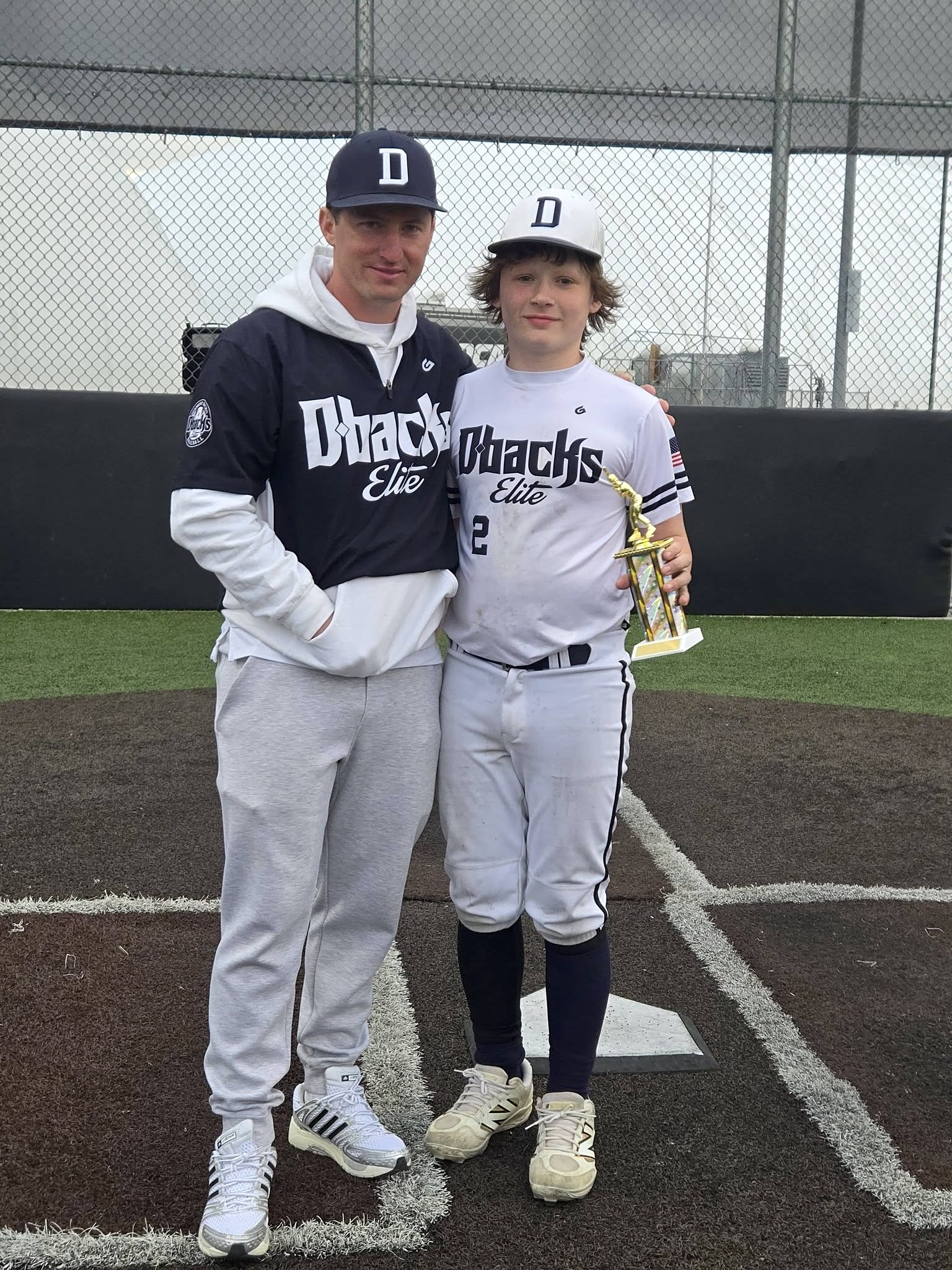 Andrew and Mason, the father and son behind Auto8, on the baseball field